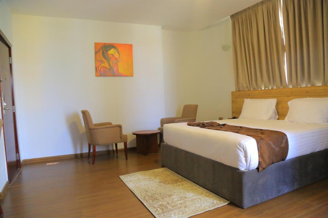 Black Horse Hotel Apartment Аддис-Абеба Экстерьер фото
